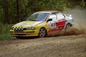 Janusz Jastrzebski / Kathy Freund Subaru Impreza at speed on SS11, Anchor Hill.