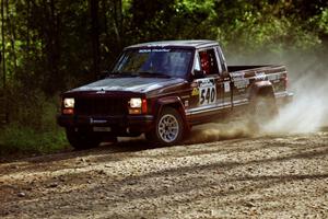 Scott Carlborn / Jim Konkler Jeep Comanche at speed on SS11, Anchor Hill.