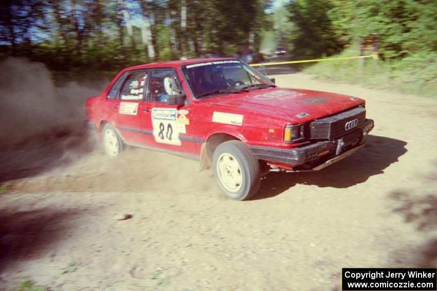 Jon Kemp / Rod Hendricksen Audi 4000 Quattro powers out of a corner on SS11, Anchor Hill.