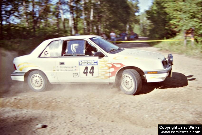 Henry Krolikowski / Cindy Krolikowski Dodge Shadow powers out of a corner on SS11, Anchor Hill.