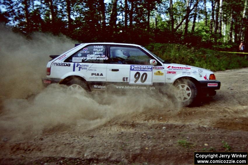 Lauchlin O'Sullivan / John Dillon Mazda 323GTX comes into a corner too hot on SS11, Anchor Hill.