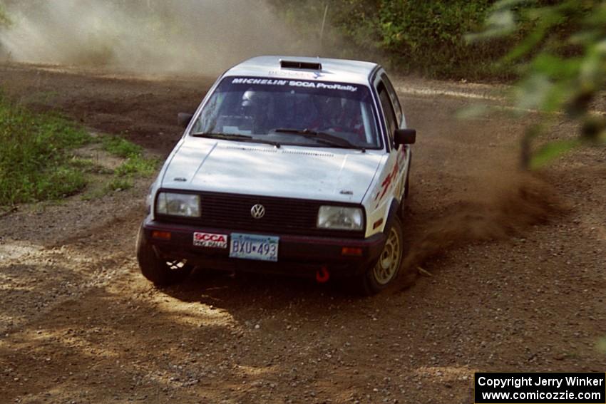 Bob Nielsen / Brenda Corneliusen VW GTI powers out of a corner on SS11, Anchor Hill.