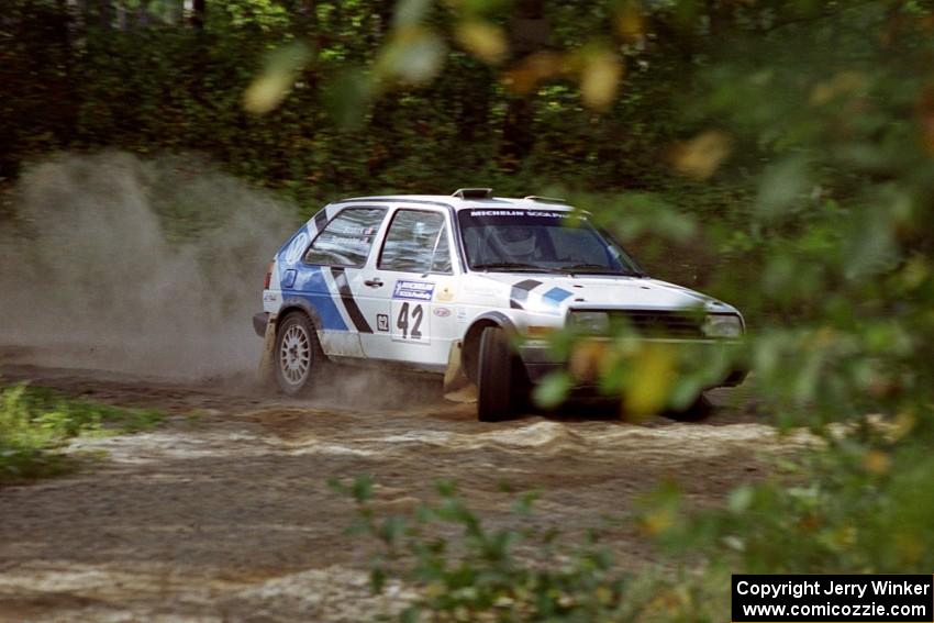 Eric Burmeister / Mark Buskirk VW GTI powers out of a corner on SS11, Anchor Hill.