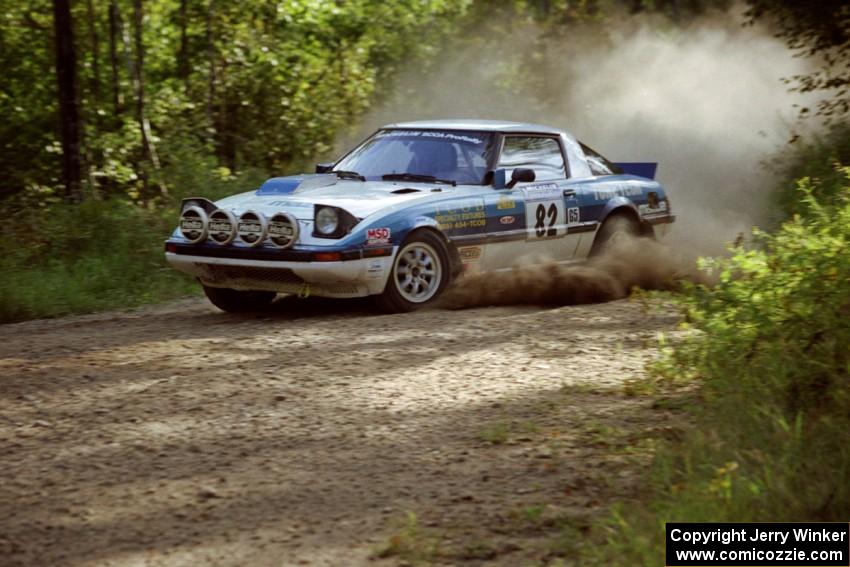 Mike Hurst / Rob Bohn Mazda RX-7 at speed on SS11, Anchor Hill.