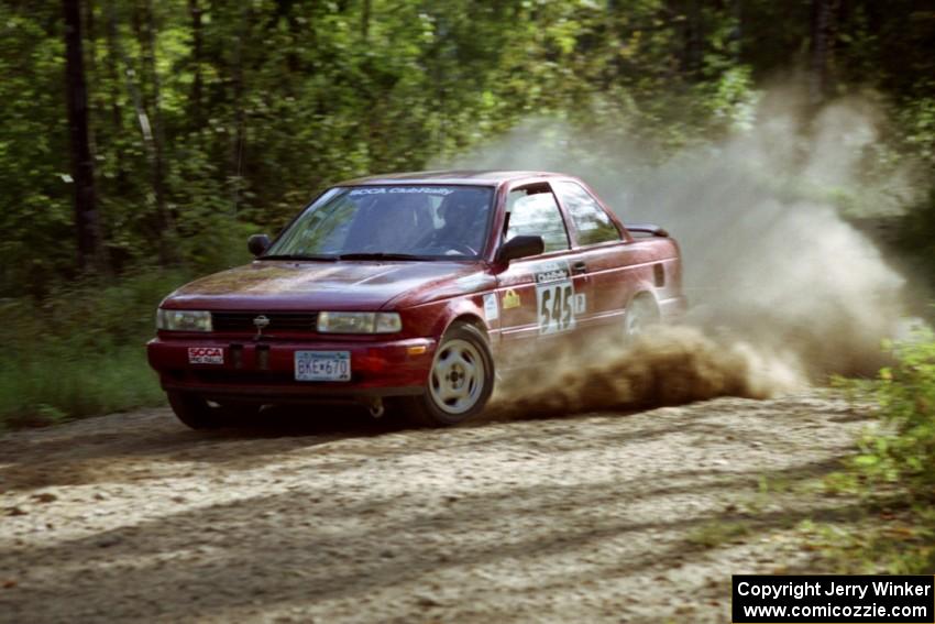 Eric Seppanen / Chris Somero Nissan Sentra SE-R at speed on SS11, Anchor Hill.