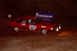 Jon Kemp / Rod Hendricksen Audi 4000 Quattro comes through the spectator corner on SS14, Perkins Road.