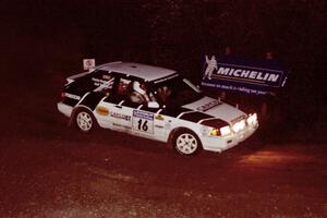 Gail Truess / Pattie Hughes Mazda 323GTX comes through the spectator corner on SS14, Perkins Road.