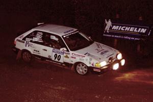 Lauchlin O'Sullivan / John Dillon Mazda 323GTX comes through the spectator corner on SS14, Perkins Road.