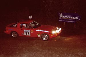 Andrew Havas / Scott Slingerland Mazda RX-7 comes through the spectator corner on SS14, Perkins Road.