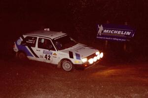 Eric Burmeister / Mark Buskirk VW GTI comes through the spectator corner on SS14, Perkins Road.