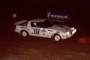 Ted Grzelak / Chris Plante Mazda RX-7 comes through the spectator corner on SS14, Perkins Road.