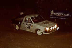 Jim Buchwitz / C.O. Rudstrom Ford Escort comes through the spectator corner on SS14, Perkins Road.