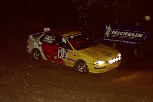 Janusz Jastrzebski / Kathy Freund Subaru Impreza comes through the spectator corner on SS14, Perkins Road.