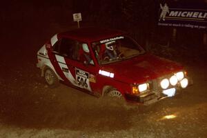 Erik Payeur / Adam Payeur Dodge Omni comes through the spectator corner on SS14, Perkins Road.