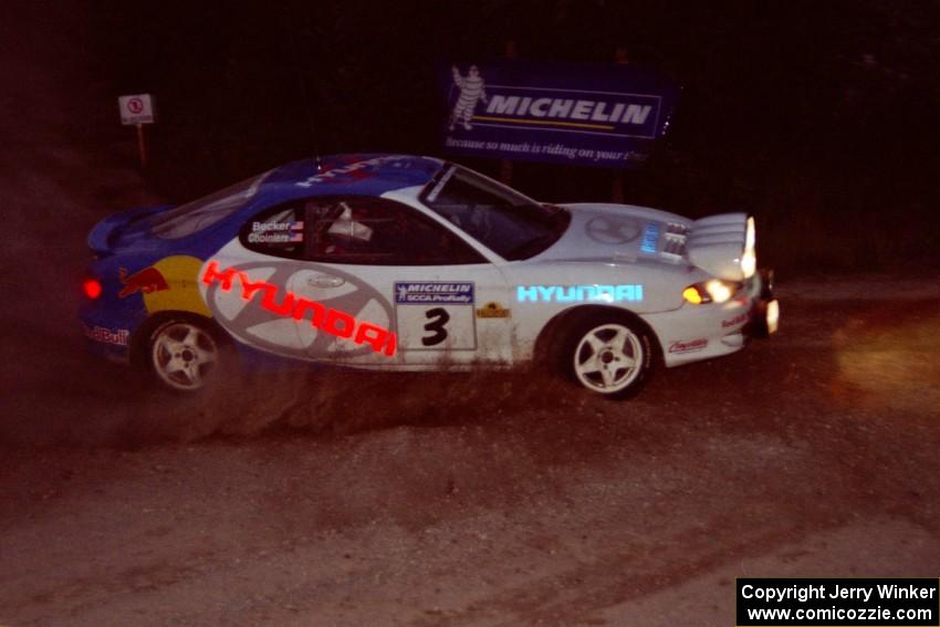 Paul Choiniere / Jeff Becker Hyundai Tiburon comes through the spectator corner on SS14, Perkins Road.