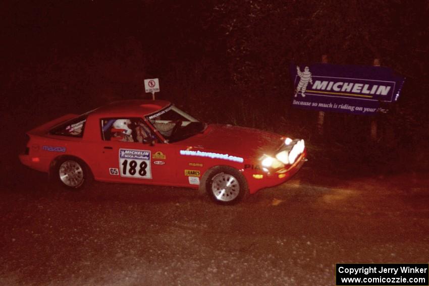 Andrew Havas / Scott Slingerland Mazda RX-7 comes through the spectator corner on SS14, Perkins Road.