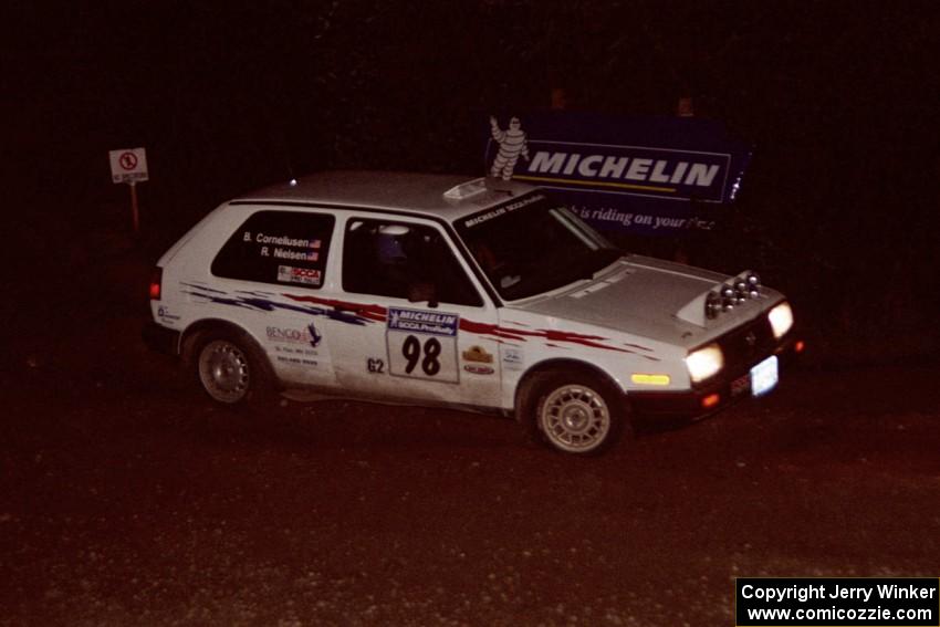 Bob Nielsen / Brenda Corneliusen VW GTI comes through the spectator corner on SS14, Perkins Road.