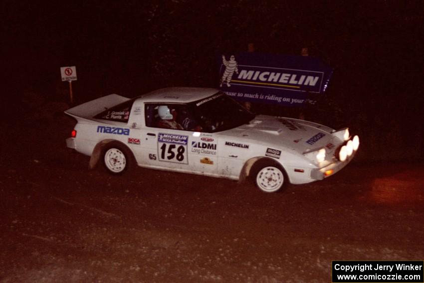 Ted Grzelak / Chris Plante Mazda RX-7 comes through the spectator corner on SS14, Perkins Road.