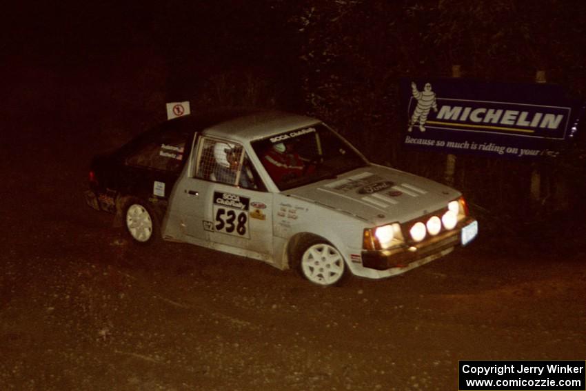 Jim Buchwitz / C.O. Rudstrom Ford Escort comes through the spectator corner on SS14, Perkins Road.