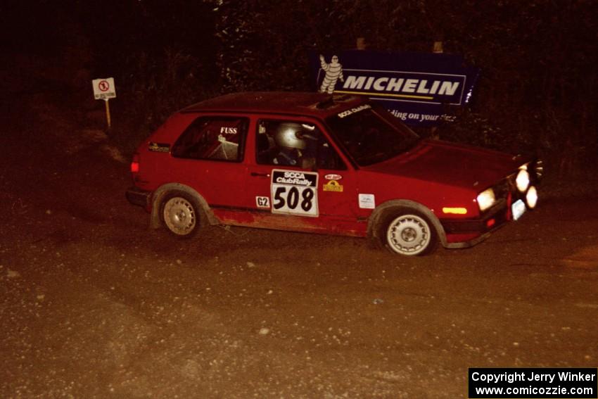 Mike Magozzi / Dave Fuss VW Golf comes through the spectator corner on SS14, Perkins Road.