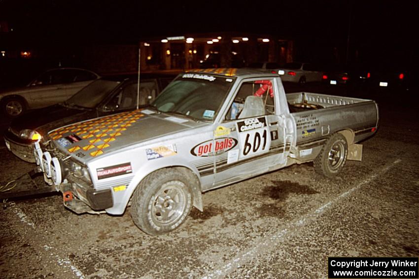 Adam Burney / Emily Burton-Weinman Dodge Ram 50 sporting damage after the 10,000 Lakes Club Rally