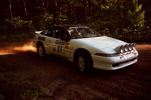 Chris Czyzio / Eric Carlson Mitsubishi Eclipse GSX at a 90-right on SS1, Akeley Cutoff.