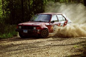 Erik Payeur / Adam Payeur Dodge Omni at speed on SS11, Anchor Hill.