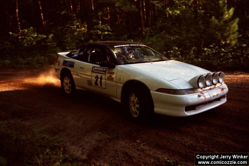 Chris Czyzio / Eric Carlson Mitsubishi Eclipse GSX at a 90-right on SS1, Akeley Cutoff.