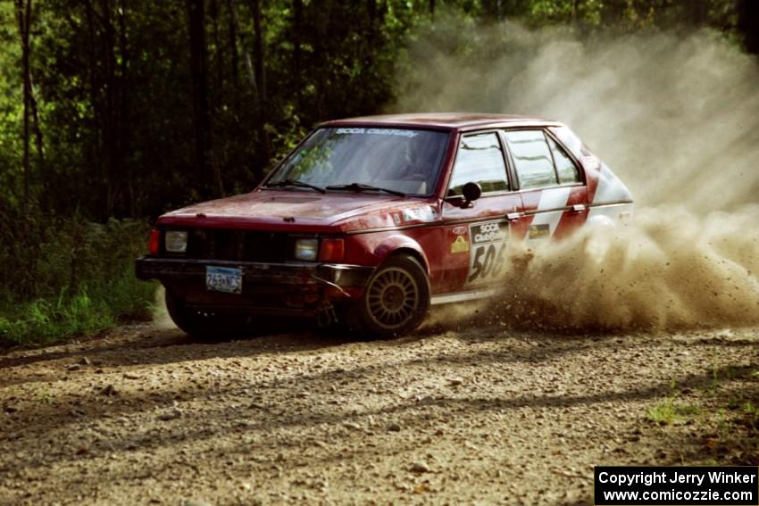 Erik Payeur / Adam Payeur Dodge Omni at speed on SS11, Anchor Hill.