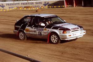 Gail Truess / Pattie Hughes Mazda 323GTX on SS1, Fairgrounds.