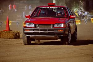 Doug Robinson / Sue Robinson Mazda 323GTX on SS1, Fairgrounds.