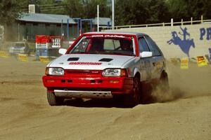 Eric Eaton / Kenny Almquist Mazda 323GTX on SS1, Fairgrounds.