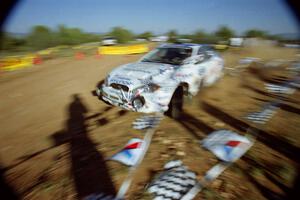 Noel Lawler / Charles Bradley Hyundai Tiburon rips up the inside banner and post at the spectator corner on SS8, Limestone I.