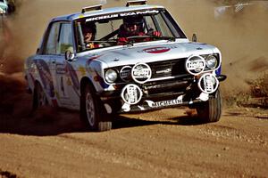 Mike Whitman / Flynn Baglin Datsun 510 at the spectator corner on SS8, Limestone I.