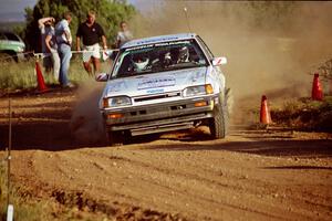 Mark Tabor / John Dillon Mazda 323GTX at the spectator corner on SS8, Limestone I.