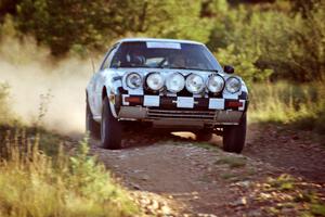 Cable Rhodes / Tyler Rhodes Mazda RX-7 comes into the spectator corner on SS8, Limestone I.