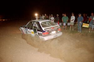 Gail Truess / Pattie Hughes Mazda 323GTX at the spectator corner on SS9, Limestone II.