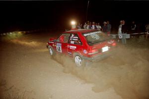 Doug Robinson / Sue Robinson Mazda 323GTX at the spectator corner on SS9, Limestone II.