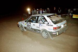 Mark Tabor / John Dillon Mazda 323GTX at the spectator corner on SS9, Limestone II.