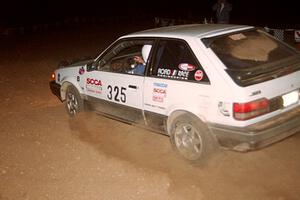 Bruce Brown / Pat Brown Mazda 323GTX at the spectator corner on SS9, Limestone II.