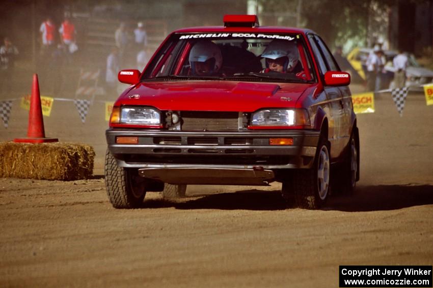 Doug Robinson / Sue Robinson Mazda 323GTX on SS1, Fairgrounds.