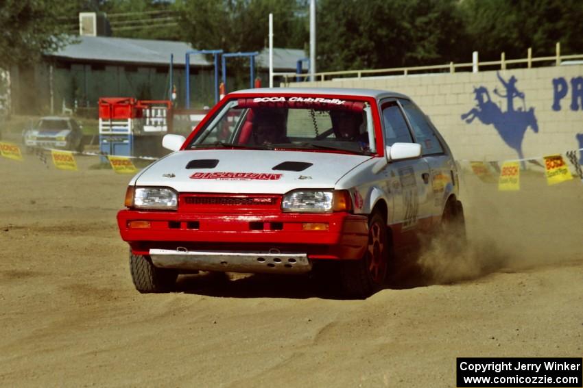 Eric Eaton / Kenny Almquist Mazda 323GTX on SS1, Fairgrounds.