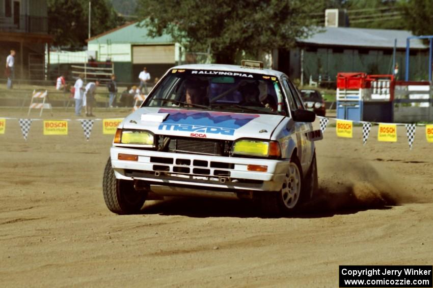 Paul Timmerman / Ola Lysenstoen Mazda 323GTX on SS1, Fairgrounds.