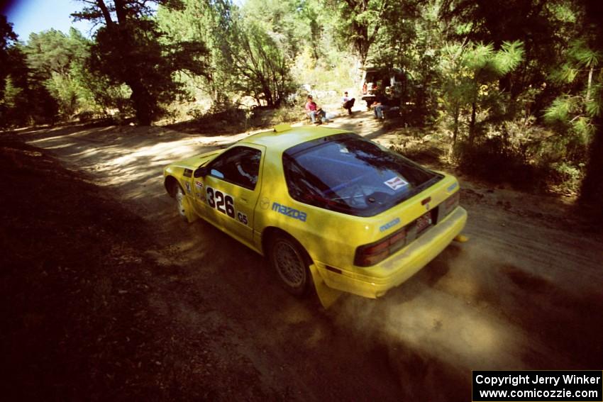 Paul Bojinov / Julian Ragalie Mazda RX-7 leaves the start of SS5, Mingus Mountain II.