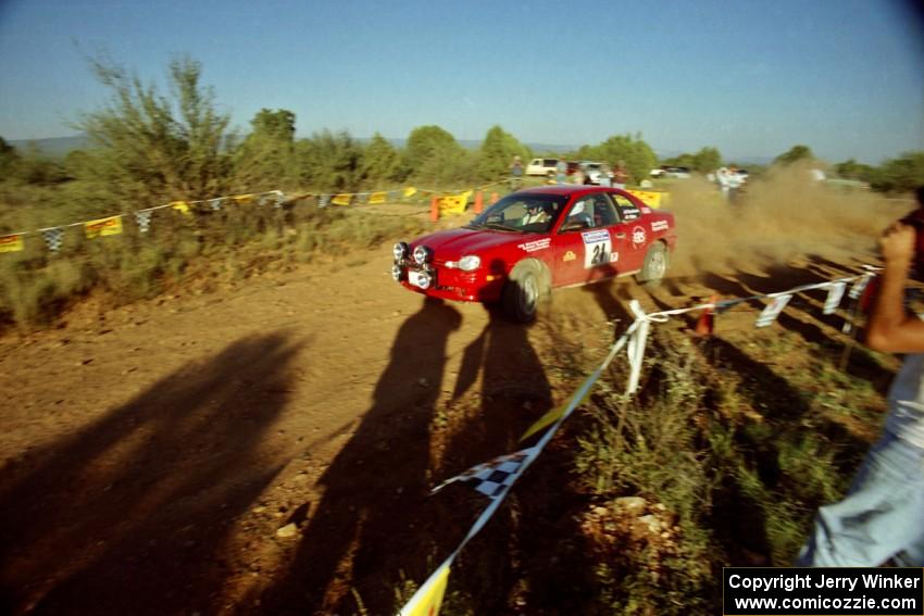 Trevor Donison / John Allen Plymouth Neon at the spectator corner on SS8, Limestone I.