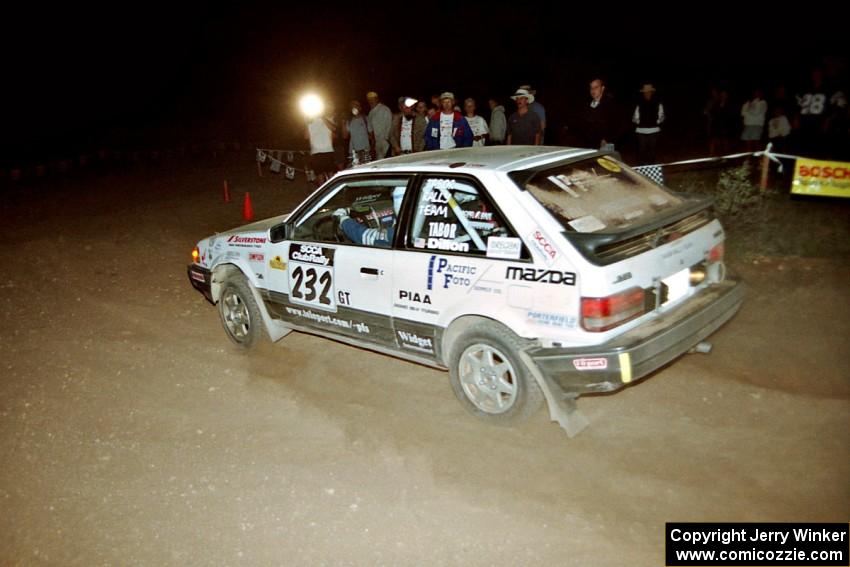 Mark Tabor / John Dillon Mazda 323GTX at the spectator corner on SS9, Limestone II.