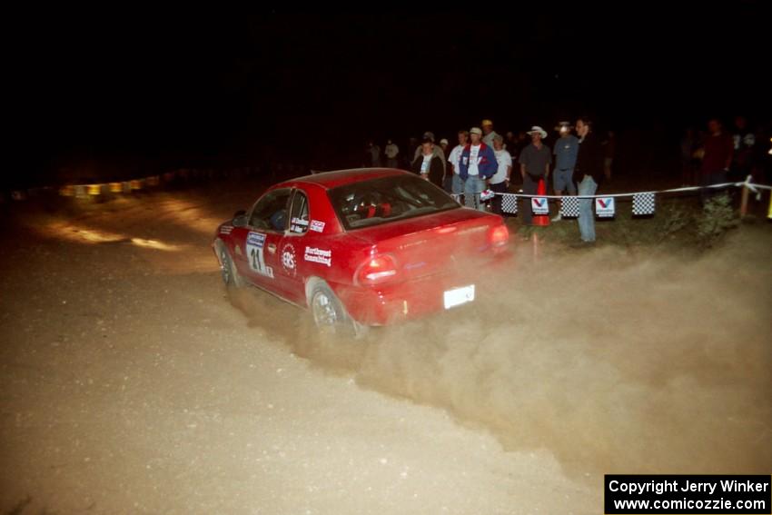 Trevor Donison / John Allen Plymouth Neon at the spectator corner on SS9, Limestone II.