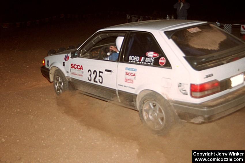 Bruce Brown / Pat Brown Mazda 323GTX at the spectator corner on SS9, Limestone II.