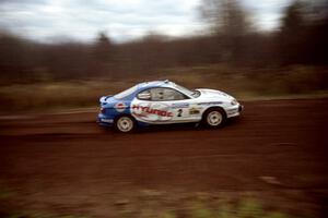 Noel Lawler / Charles Bradley Hyundai Tiburon at speed on the practice stage.