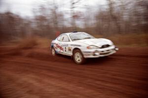 Noel Lawler / Charles Bradley Hyundai Tiburon at speed on the practice stage.